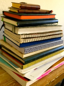 A small stack of personal journals